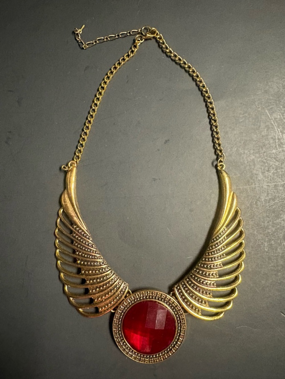 Gold Wing Statement Necklace with Red Center